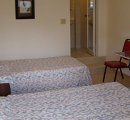 Micro Beach Hotel Garapan Zimmer foto